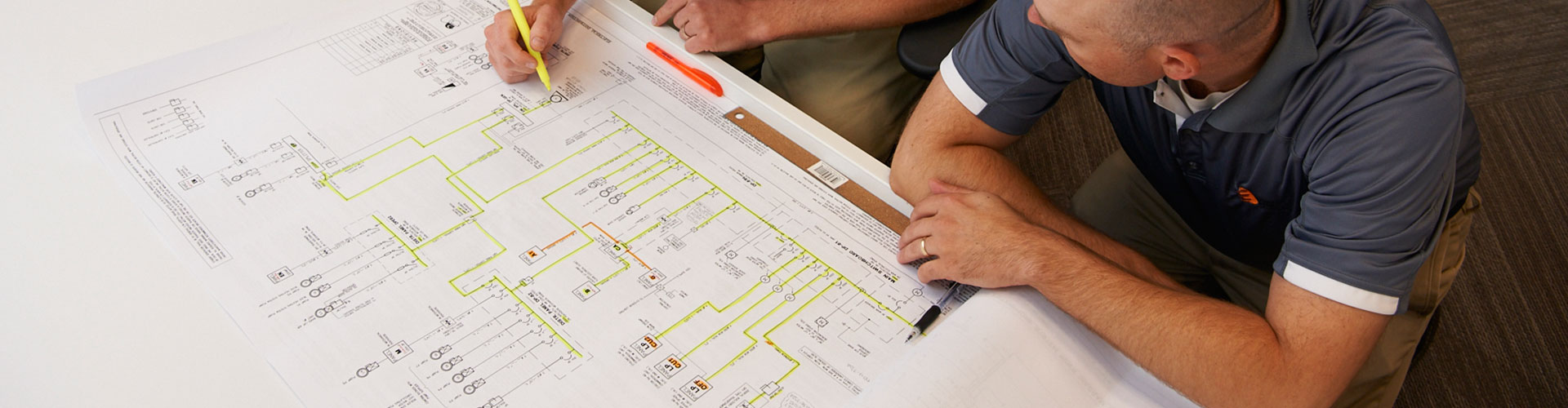 person reviewing plans